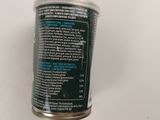 a can of food that is sitting on a table