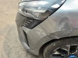 a close up of a car that has been dented