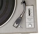 a turntable with a record player attached to it