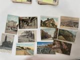 many old postcards on a refrigerator with pictures on them