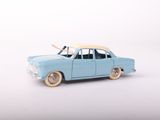 a toy car with a surfboard on top of it