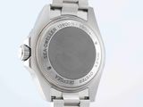 an image of a close up of a wrist watch on a white surface