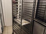 an image of a commercial kitchen with a rack of food