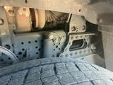 a close up view of a tire on a truck