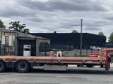 a large semi truck that is parked in a lot
