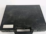 a black briefcase that is sitting on a table