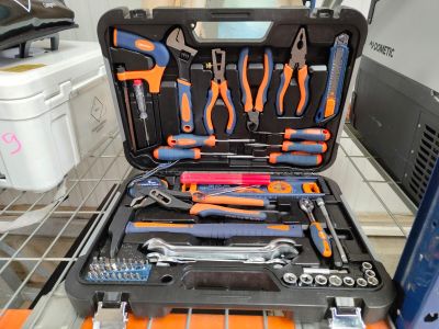 many tools in a tool case on the shelf