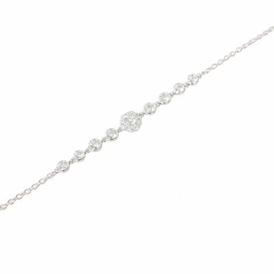 a close up of a diamond bracelet on a white background