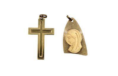 two cross pendants with a face of jesus and a face of jesus