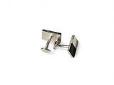 silver and black cufflinks on a white background