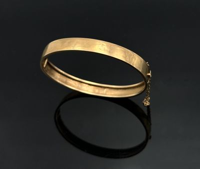 BRACELET rigide ouvrant en or jaune 750 mil. uni. Poids 7,15 g Quelque - Photo 1