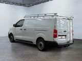 a white van that is parked in a room