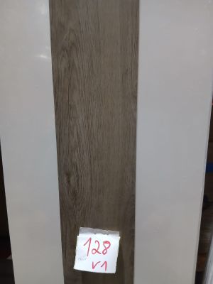 a close up of a piece of wood with a price tag on it