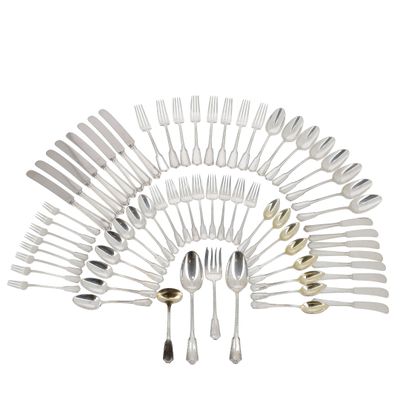 a lot of forks and spoons arranged in a circle