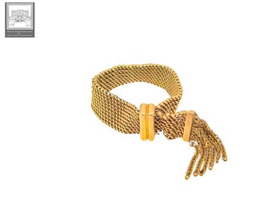 une photo d'un bracelet en or muni d'une chaîne et d'un fermoir