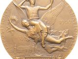an image of a gold medal with a man on the back of it