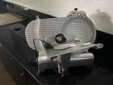 an image of a slicer on a counter top