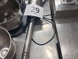 an image of a kitchen with a mixer and a bowl on the counter