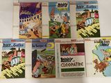 plusieurs livres pour enfants sont alignés sur une surface blanche