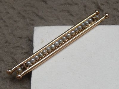 an image of a close up of a piece of jewelry on a table