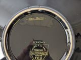 a black plate with a gold rim and a black plate with a gold rim