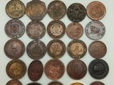 une collection de pièces britanniques comprenant un penny, un penny, un penny et un penny