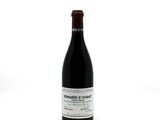 a bottle of wine that is sitting on a table