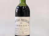 a bottle of wine that is sitting on a table
