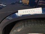 a sticker that says vauto on the side of a car
