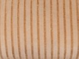 an image of a close up of a striped pillow on a bed