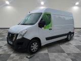 the white van is parked in a large room with a checkered floor