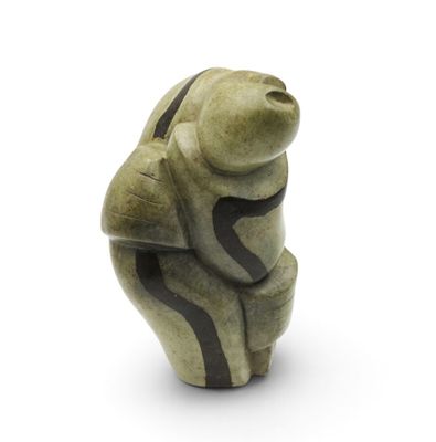 statue of a bear with a black stripe on its chest