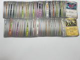 many different types of pokemon cards in this case