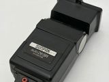 a small camera that is sitting on a white surface