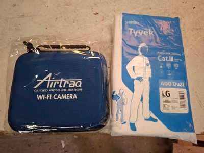 an airtraq carrying case for a camera and a bag for a camera