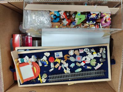 a box with a bunch of toys inside of it