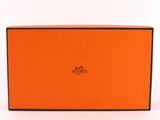 an orange box with black trim and a logo on it