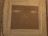 a picture of a picture in a box on the floor