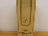 a cardboard box that has a brown label on it