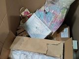 a box full of toilet paper and other items in it