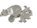 a crystal figurine of a polar bear and a bear cub