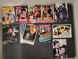 many movie posters on the wall of a refrigerator