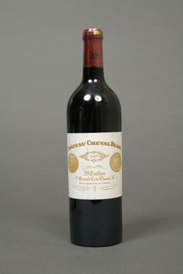 a bottle of wine that is sitting on a table