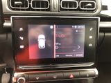 a picture of a car dashboard with a digital display