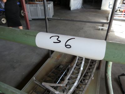 a picture of a conveyor belt with a number 36 on it