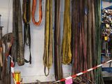 a man standing in front of a bunch of rope