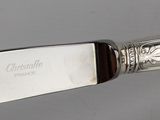a knife that is sitting on top of a table