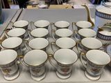 a lot of cups and saucers on the table