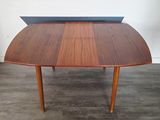 a table that has a ping pong table on top of it