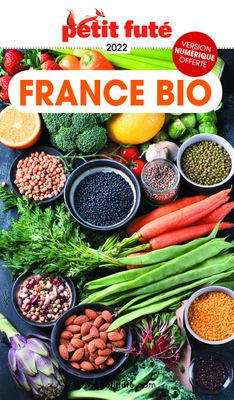 the cover of a magazine with various fruits and vegetables on it